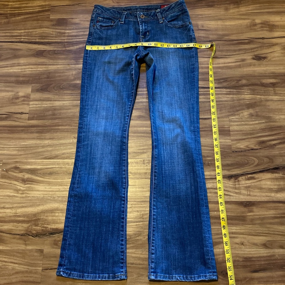 Seven blue jeans, size 29.